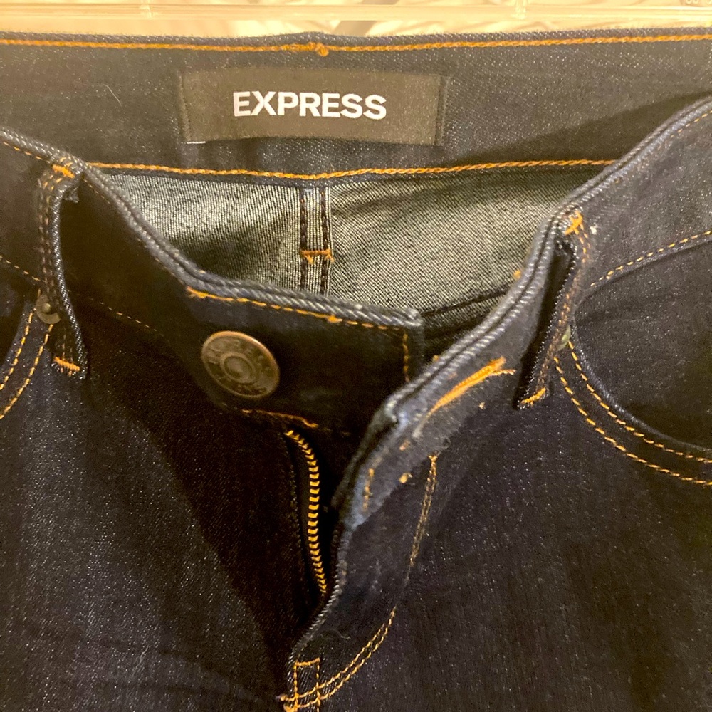 Never worn, dark washed Express jeans!  Size 2L